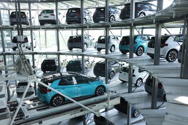 DRESDEN, GERMANY - JUNE 08: Volkswagen ID.3 electric cars stand in the storage tower following assembly at the "Gläserne Manufaktur" ("Glass Manufactory") production facility on June 08, 2021 in Dresden, Germany. The Dresden plant is currently churning out 35 ID.3 cars per day. The ID.3 and ID.4 cars are also produced at VW's Zwickau plat located in the same region. (Photo by Sean Gallup/Getty Images)