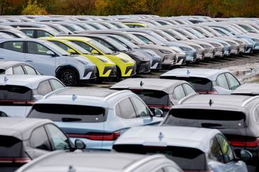 25 October 2025, Lower Saxony, Wilhelmshaven: Numerous new electric vehicles from Byd are parked in a parking lot in the port area. Photo: Hauke-Christian Dittrich/dpa (Photo by Hauke-Christian Dittrich/picture alliance via Getty Images)