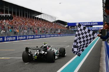 MIAMI, FLORIDA - MAY 03: Rafael Nadal waves the chequered flag for Race winner Andrea Kimi Antonelli of Italy driving the (12) Mercedes AMG Petronas F1 Team W17 during the F1 Grand Prix of Miami at Miami International Autodrome on May 03, 2026 in Miami, Florida. (Photo by Mario Renzi - Formula 1/Formula 1 via Getty Images)